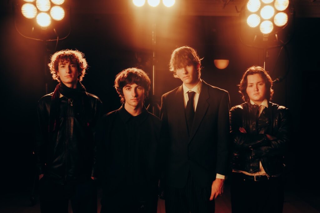 “Take the Roof Off and Sing Along”: Borderline Channel Collapse into Catharsis on “Watching It Burn,” an Arena-Sized Anthem of Ruin & Release